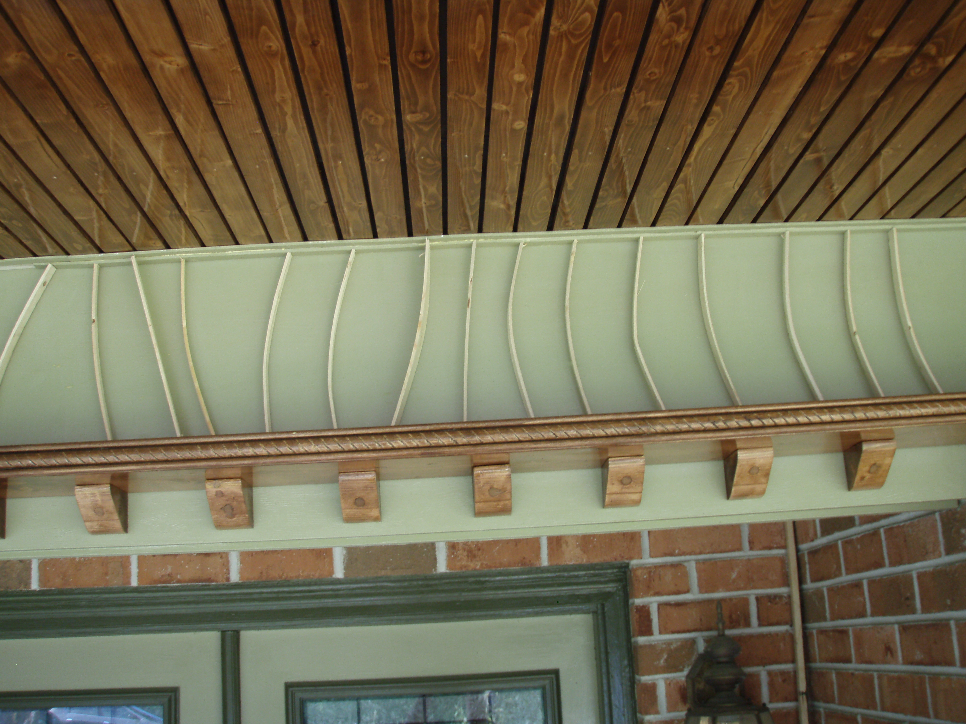 front gable porch with brick raised garden