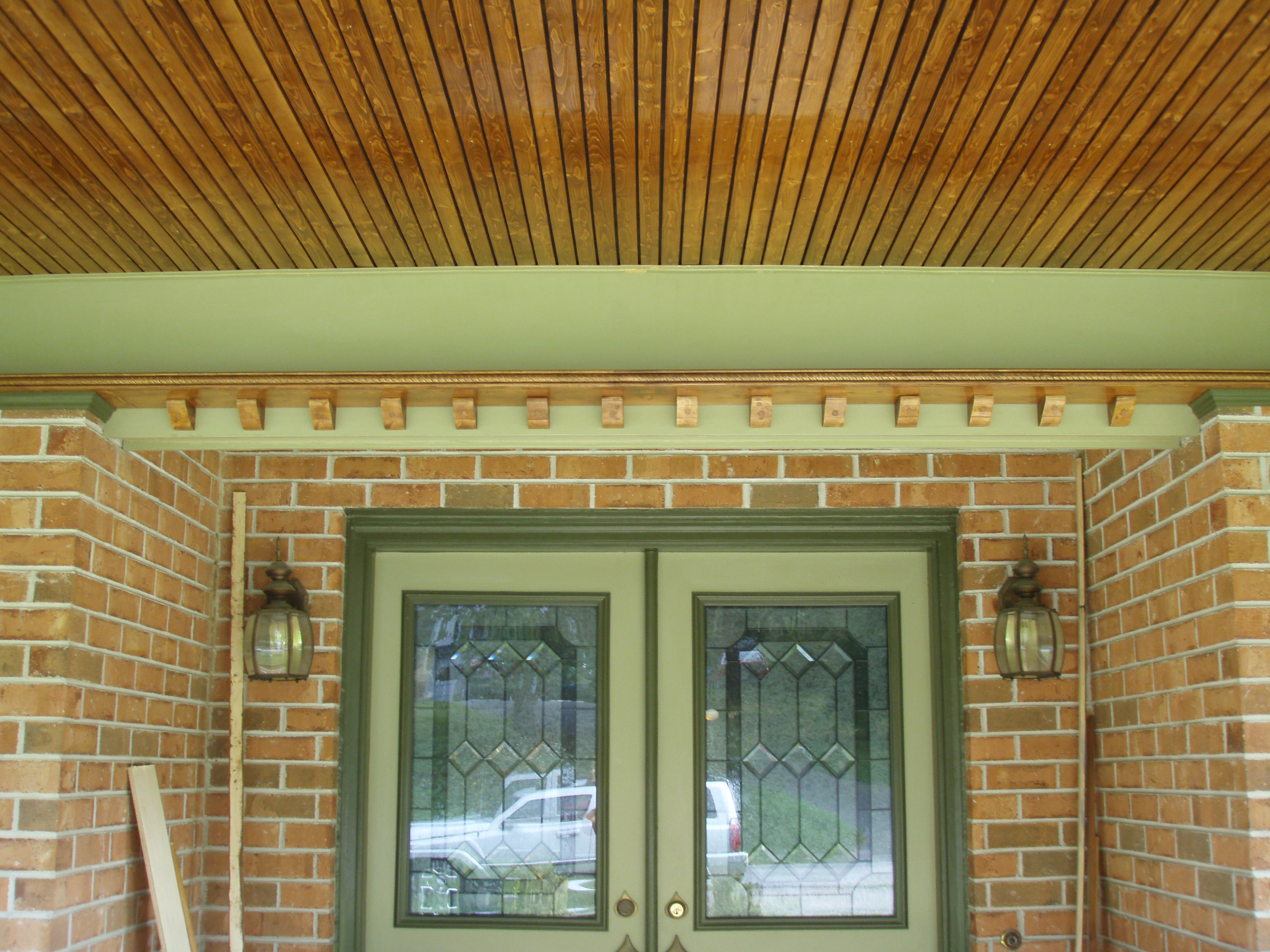 front gable porch with brick raised garden