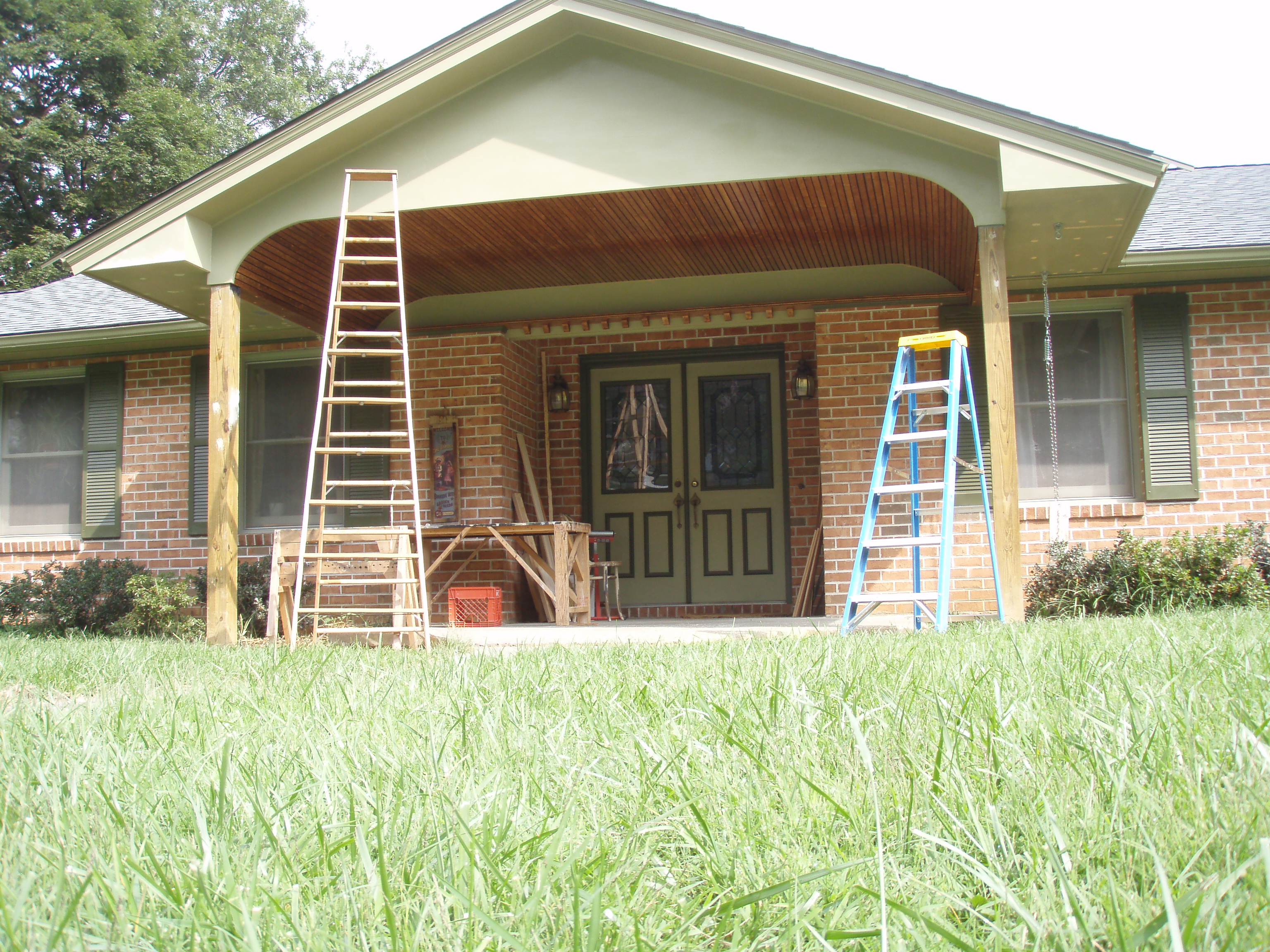 front gable porch with brick raised garden