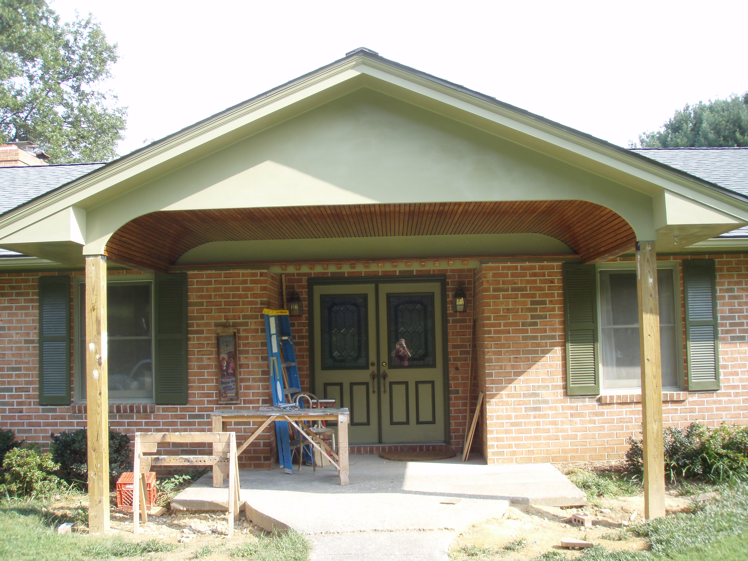 front gable porch with brick raised garden