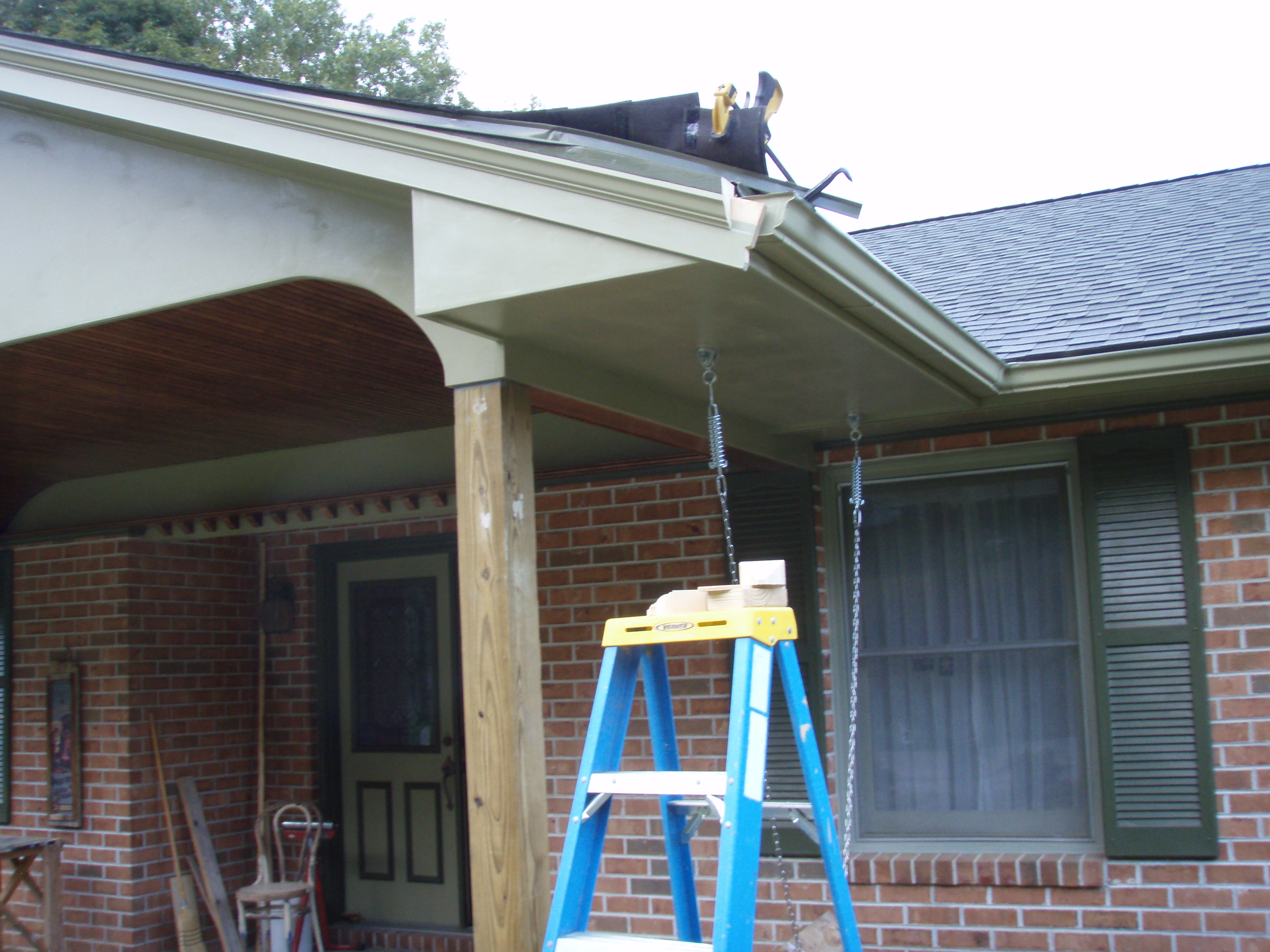 front gable porch with brick raised garden