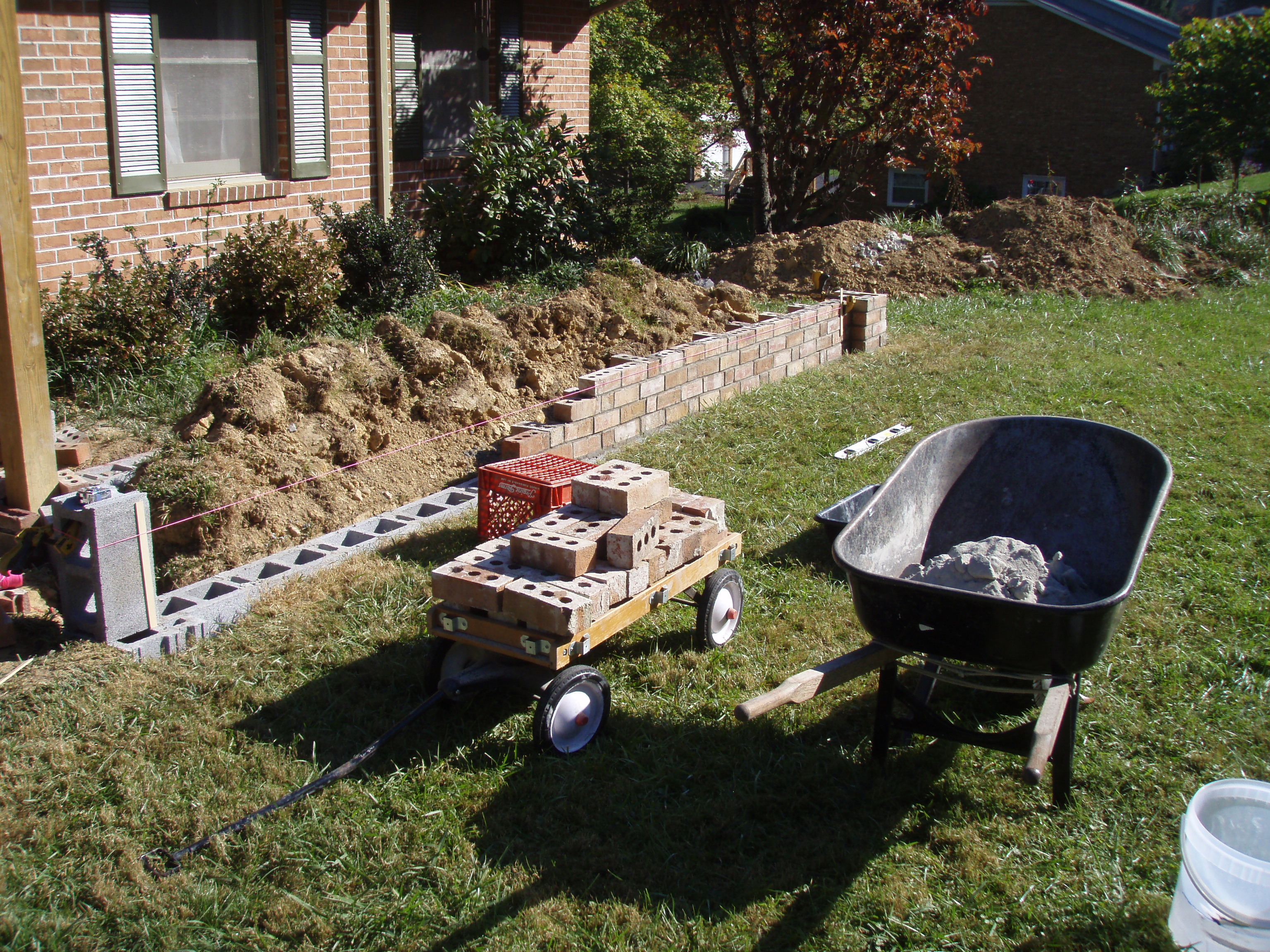 front gable porch with brick raised garden