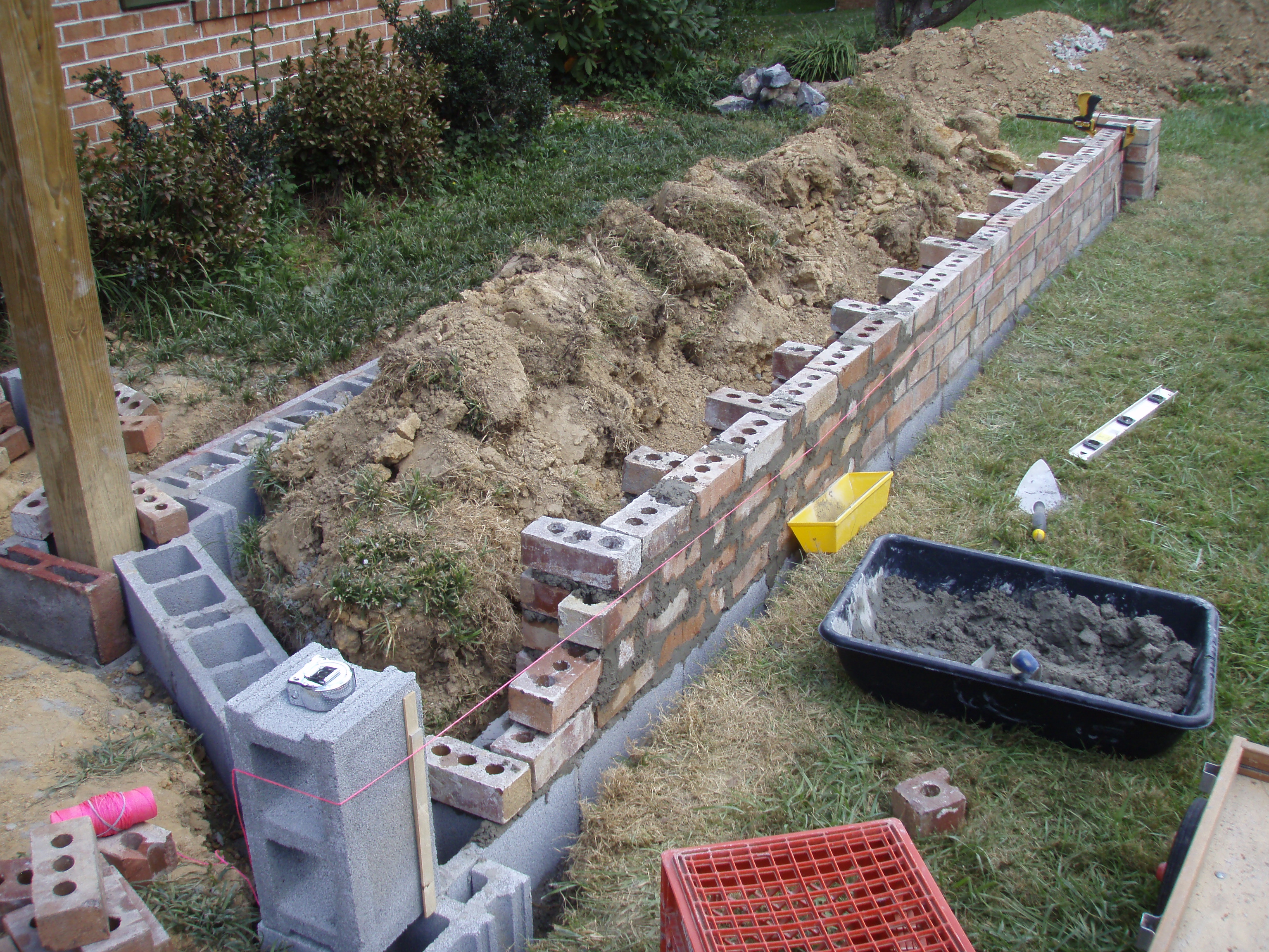 front gable porch with brick raised garden