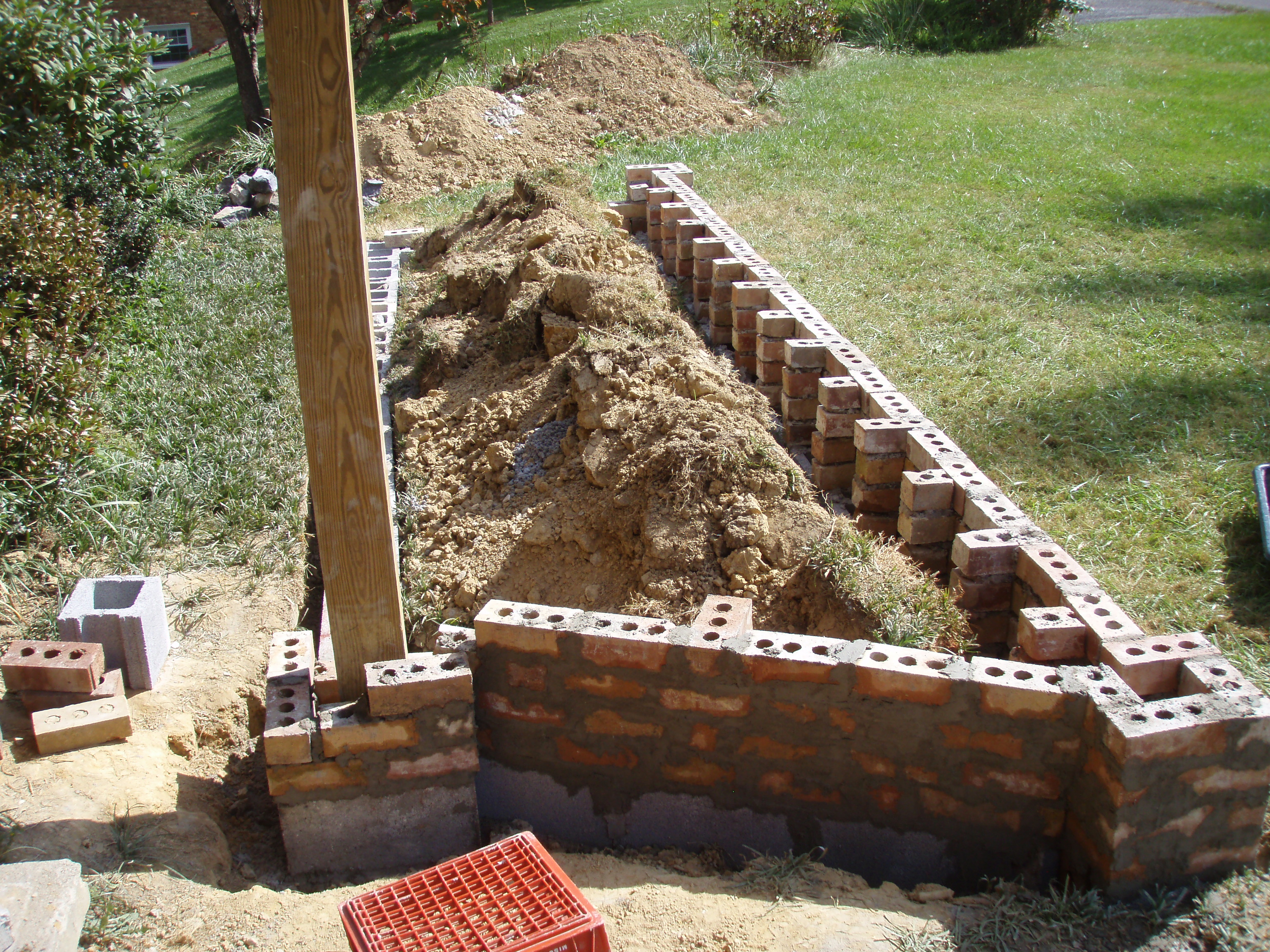 front gable porch with brick raised garden