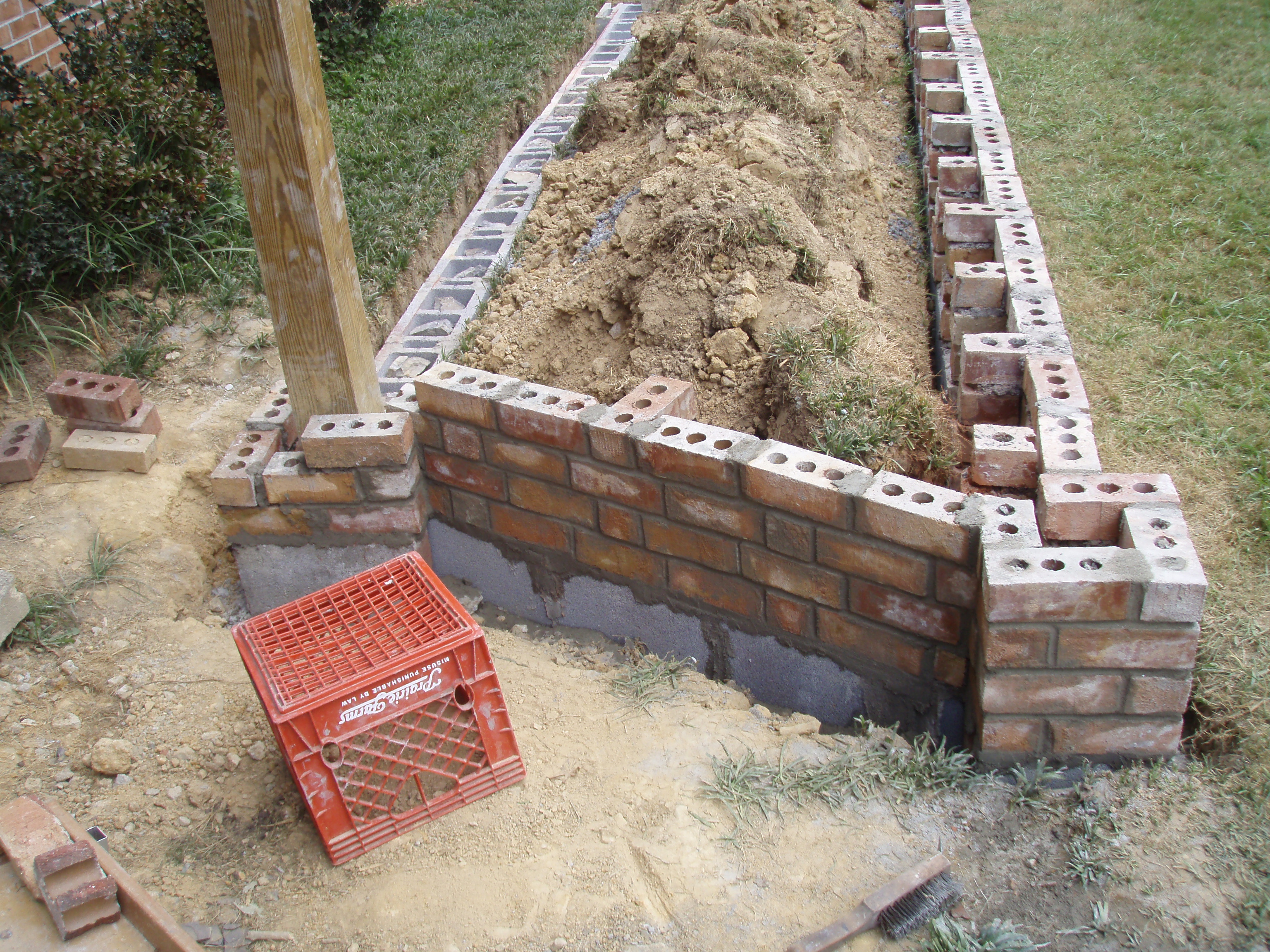 front gable porch with brick raised garden