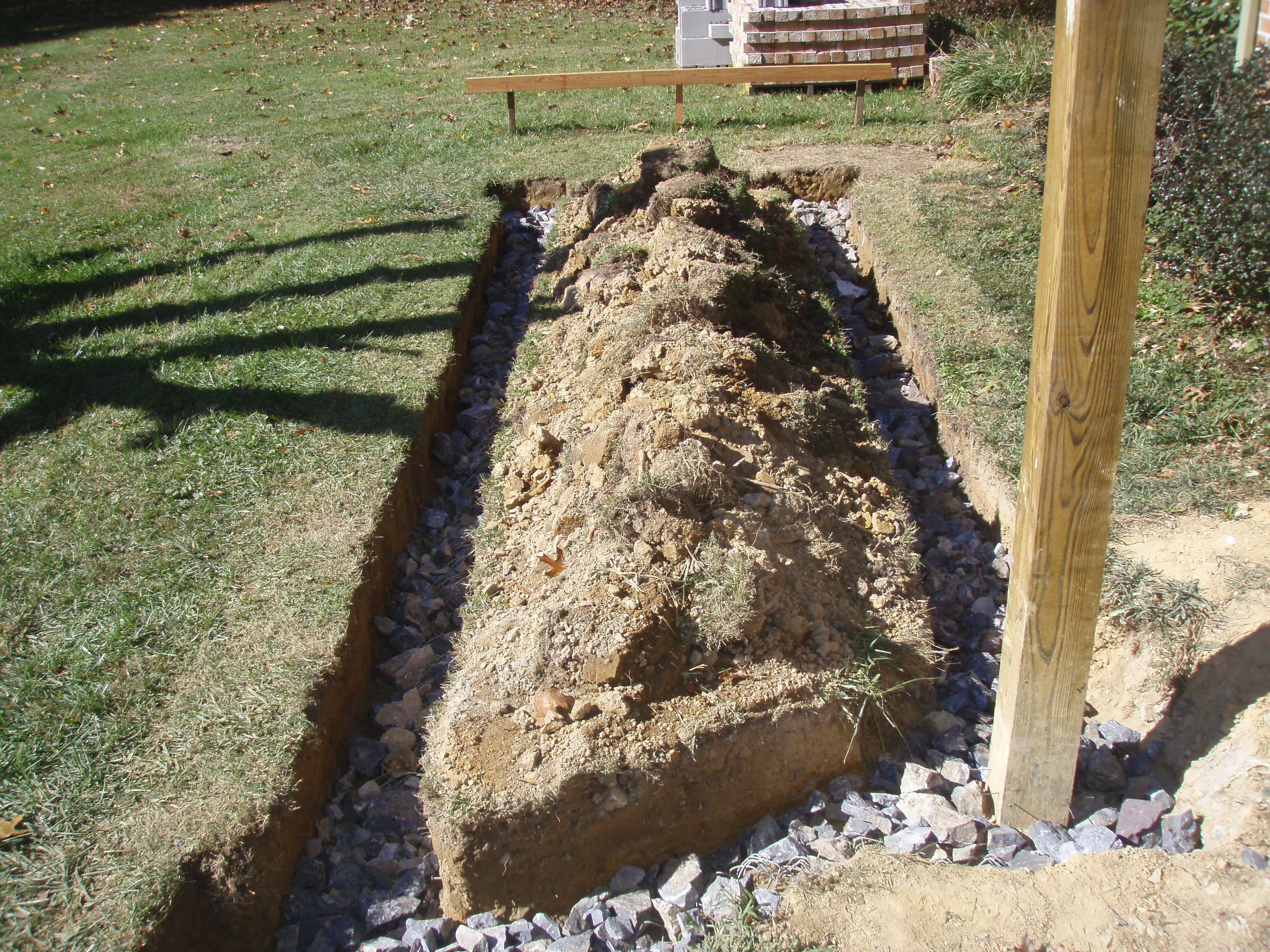 front gable porch with brick raised garden