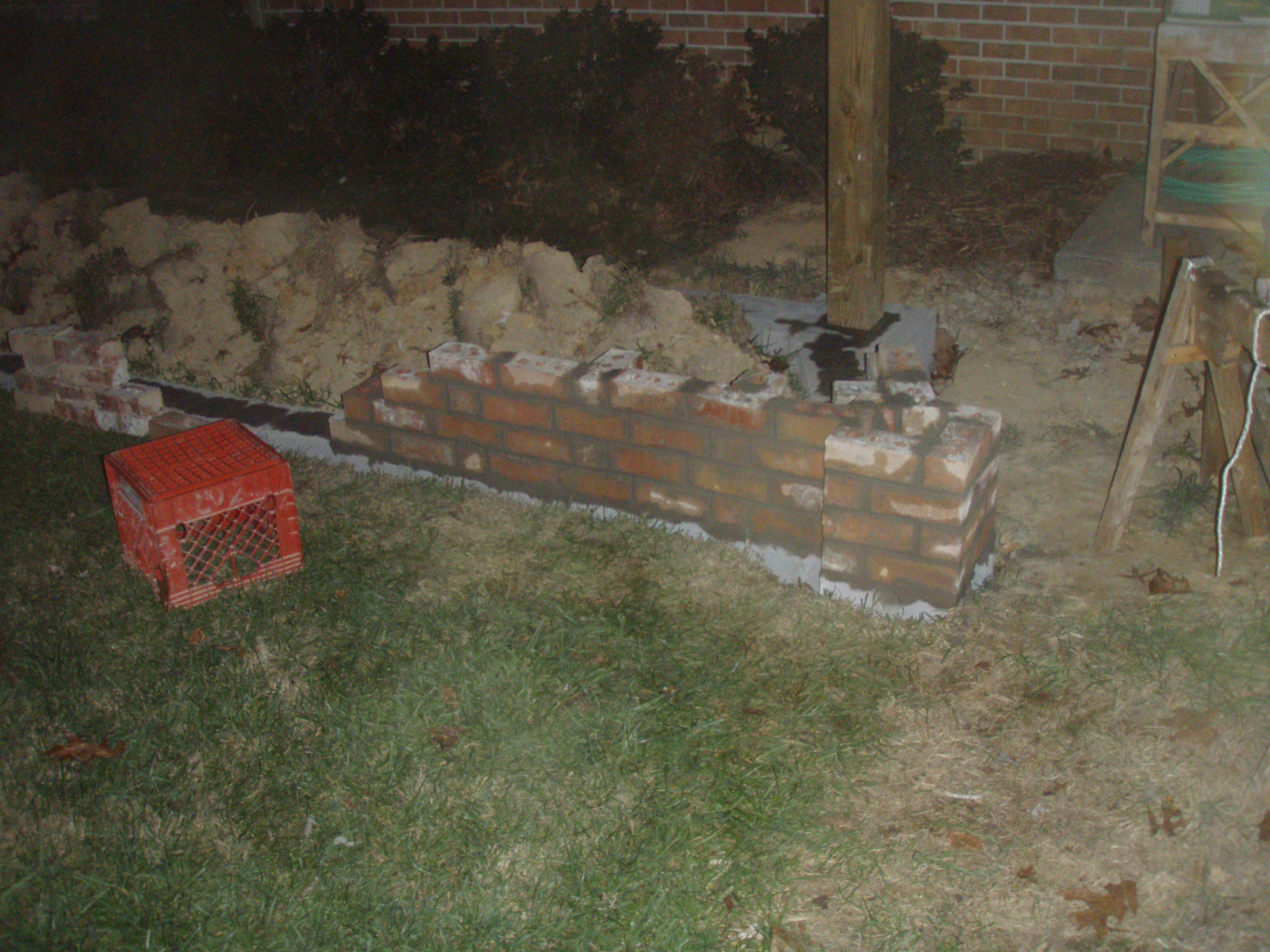 front gable porch with brick raised garden