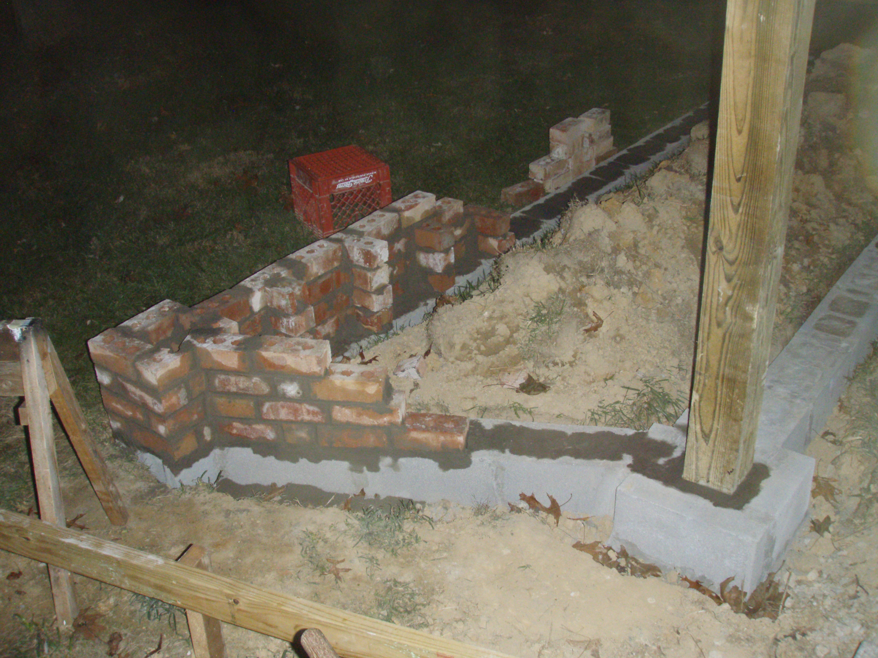 front gable porch with brick raised garden