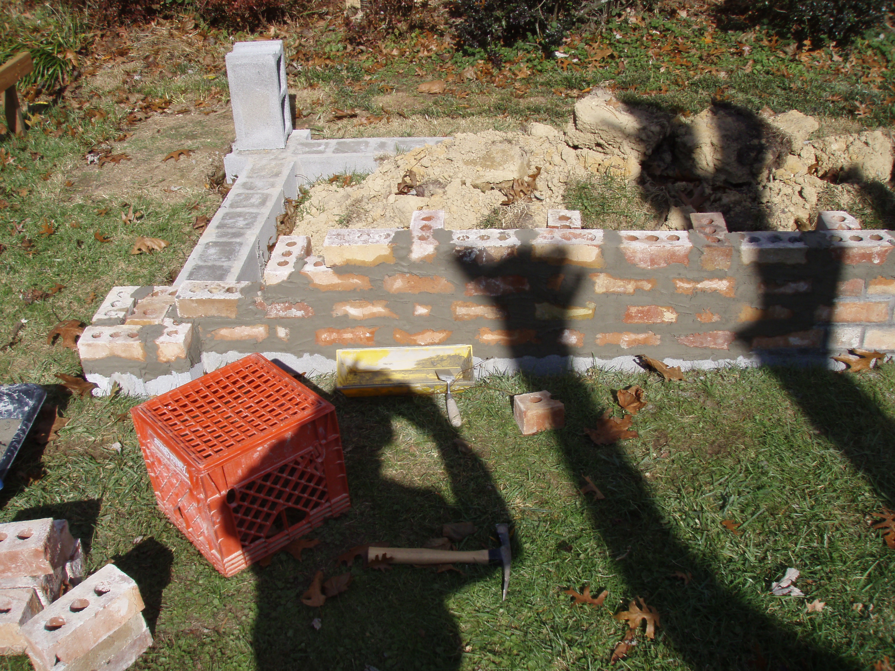 front gable porch with brick raised garden