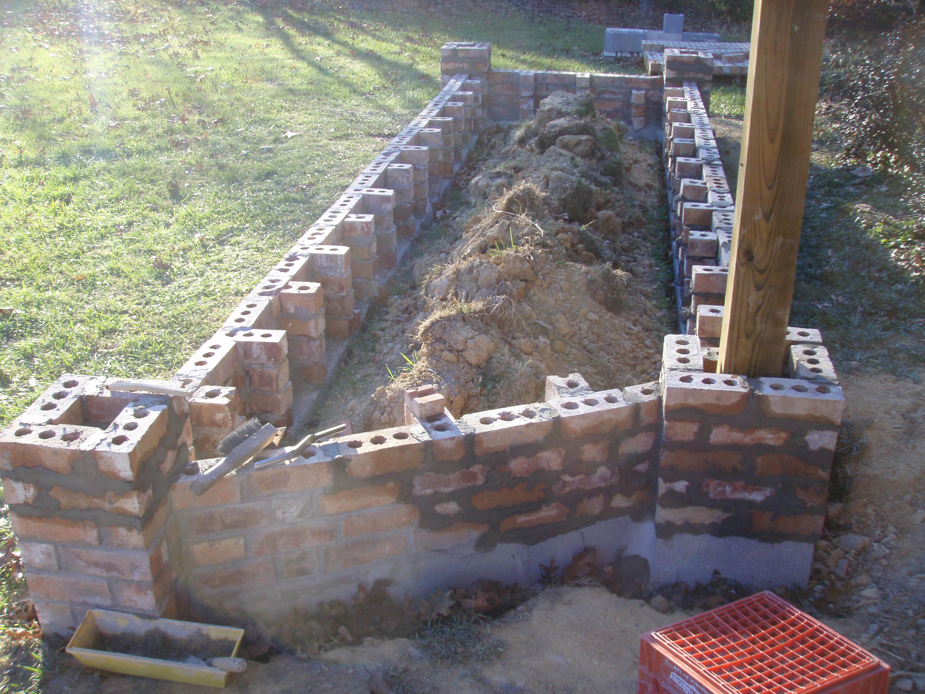 front gable porch with brick raised garden