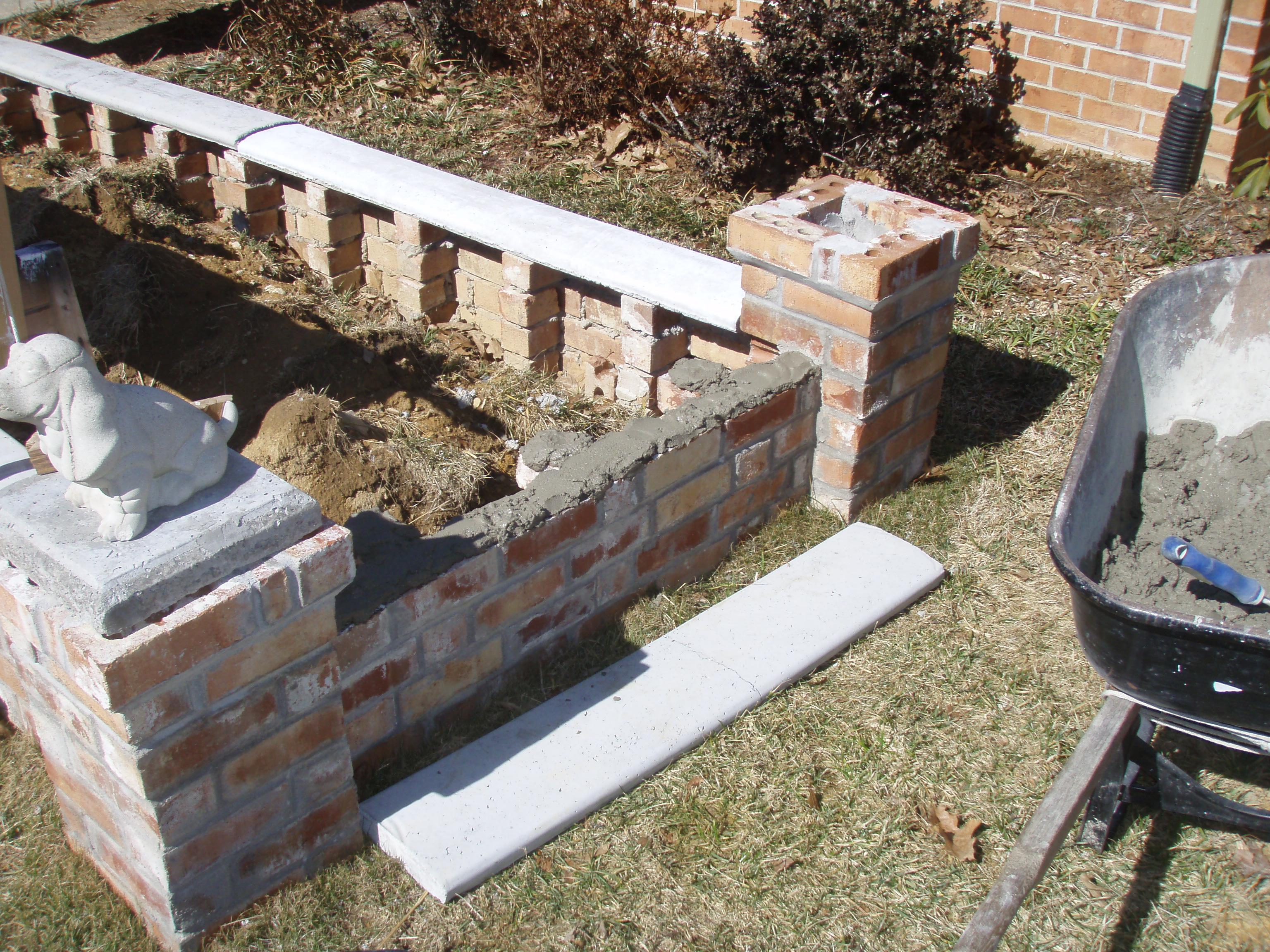 front gable porch with brick raised garden