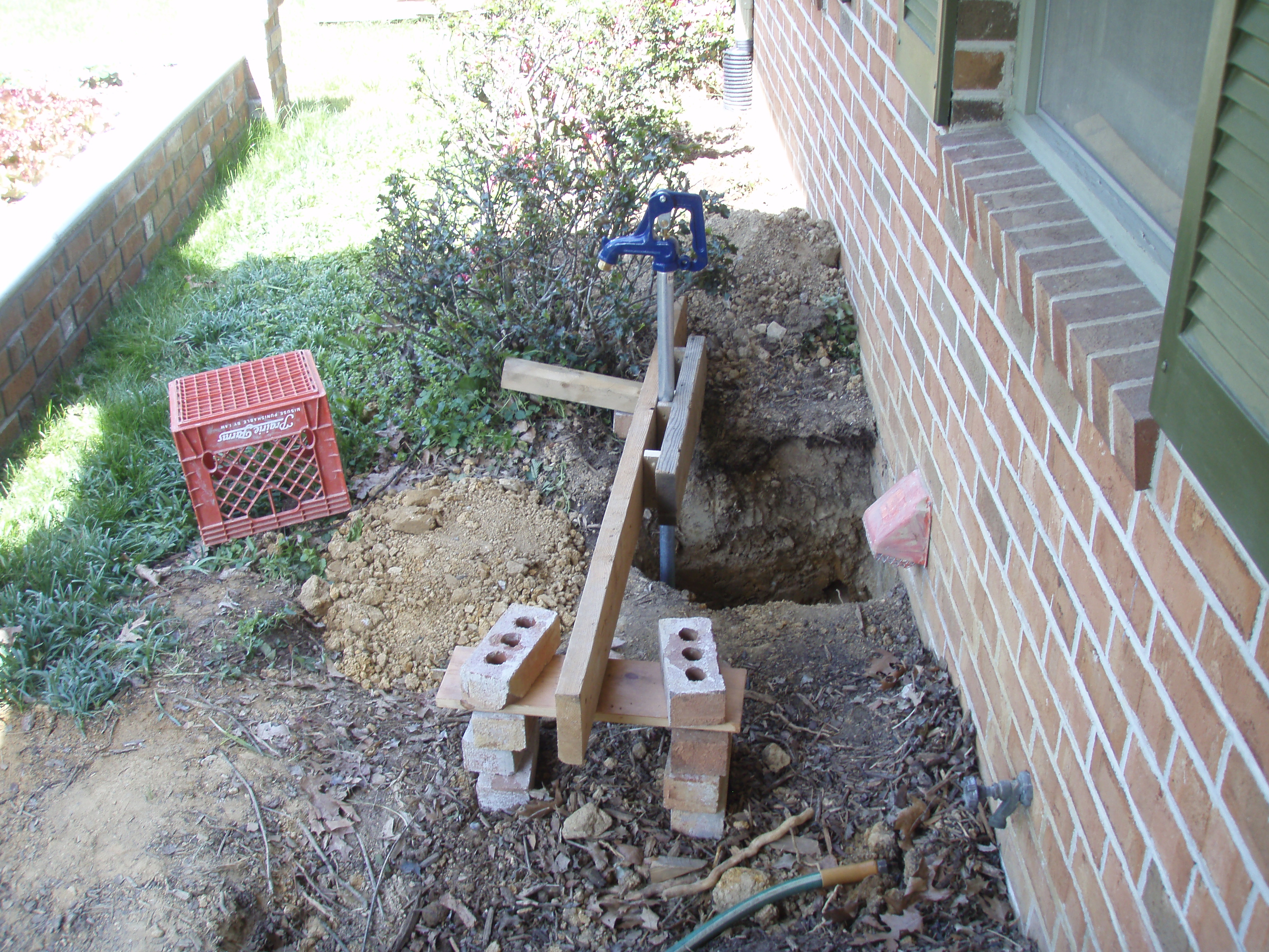 front gable porch with brick raised garden