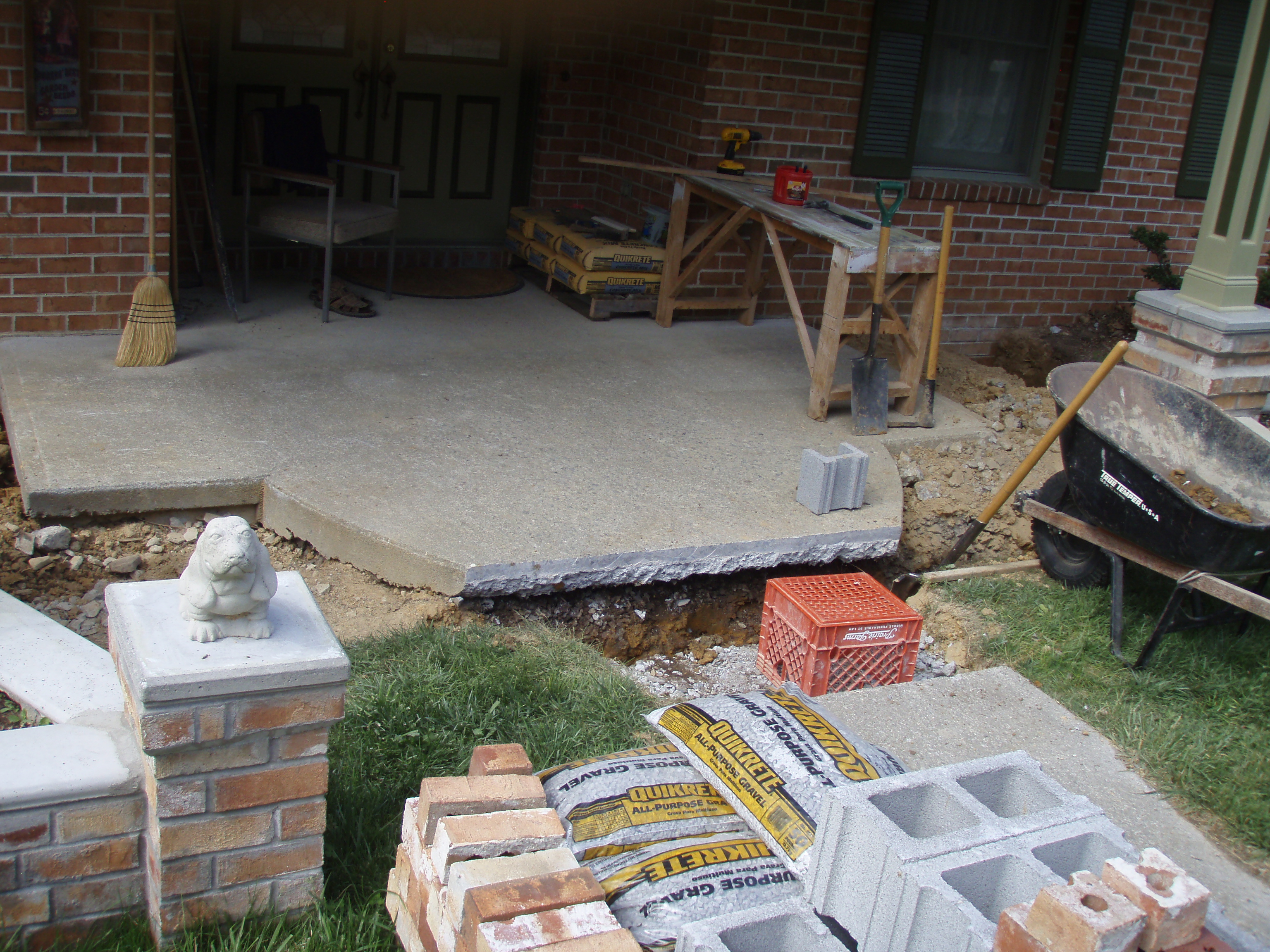 front gable porch with brick raised garden