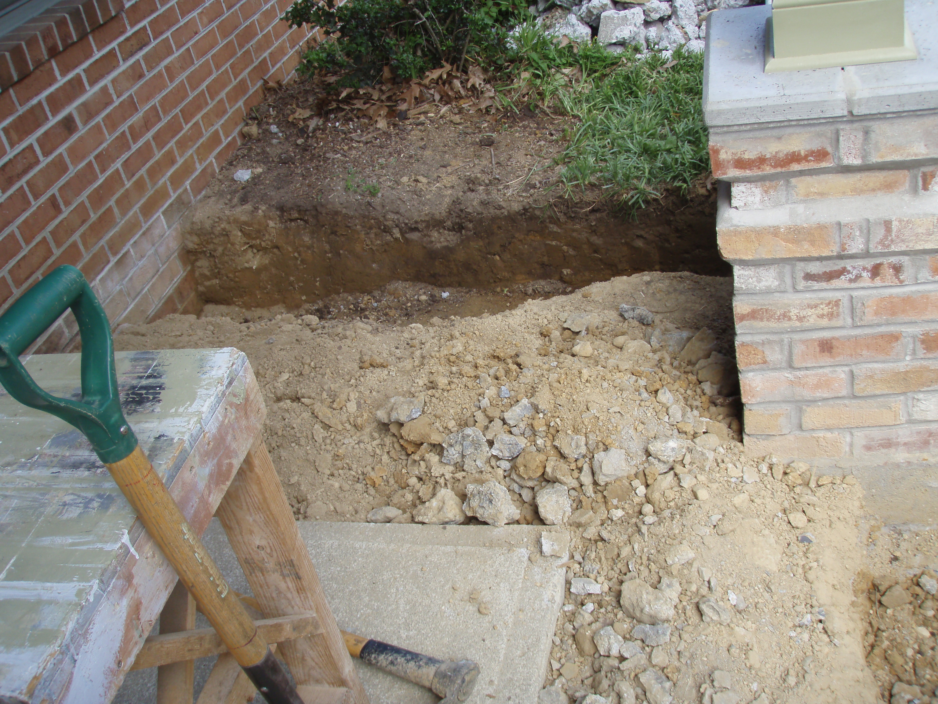 front gable porch with brick raised garden