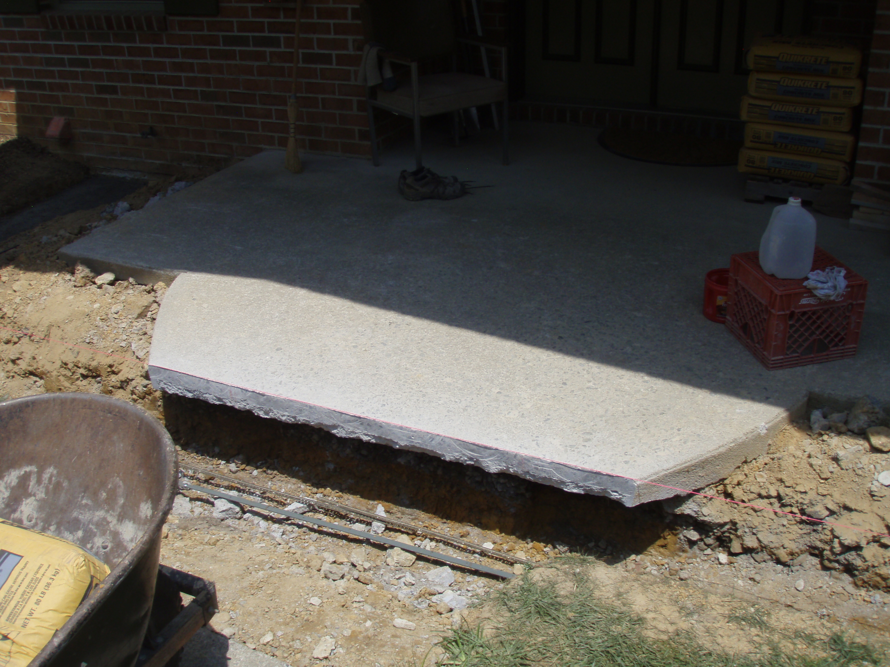 front gable porch with brick raised garden