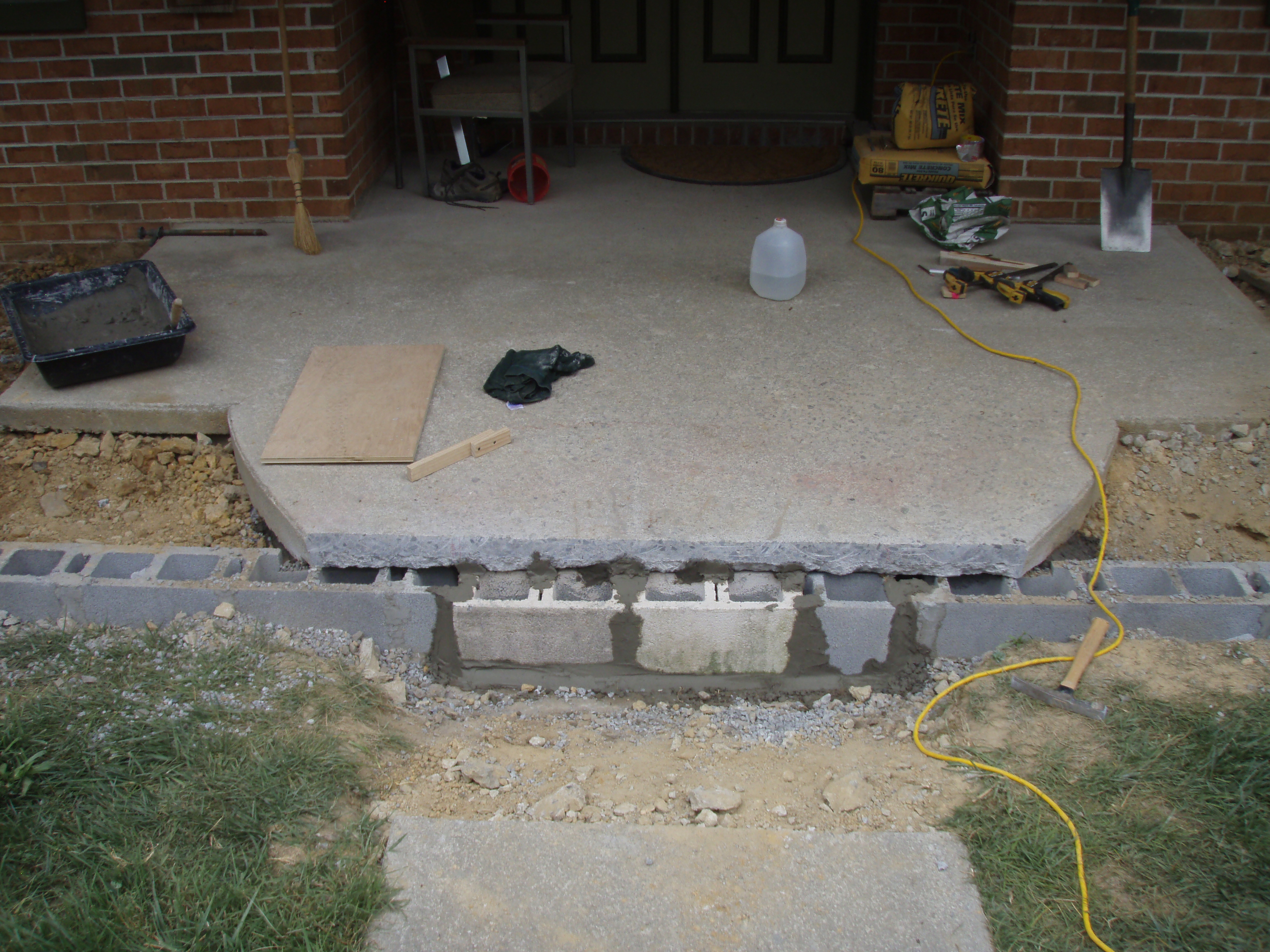 front gable porch with brick raised garden