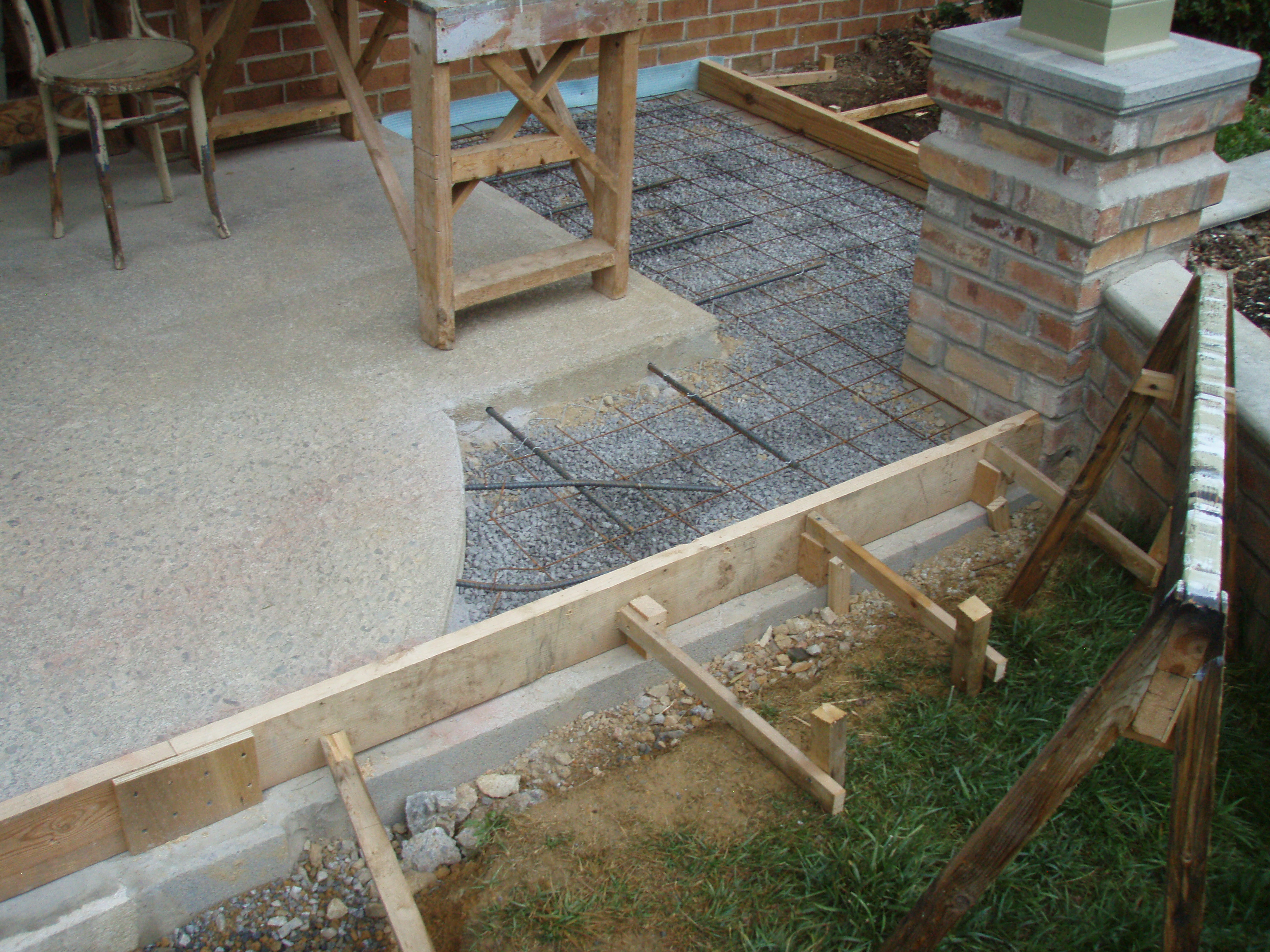 front gable porch with brick raised garden