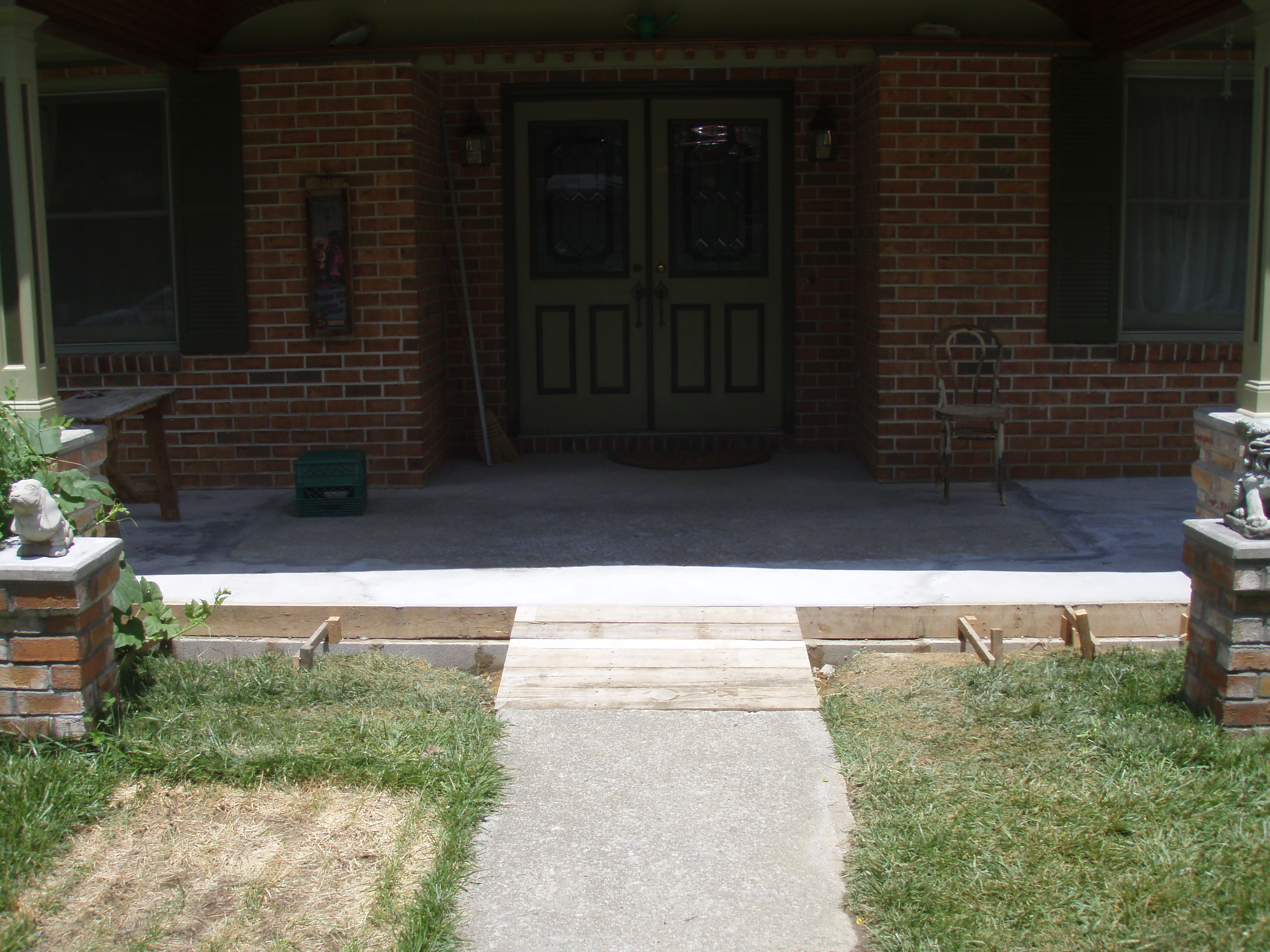 front gable porch with brick raised garden