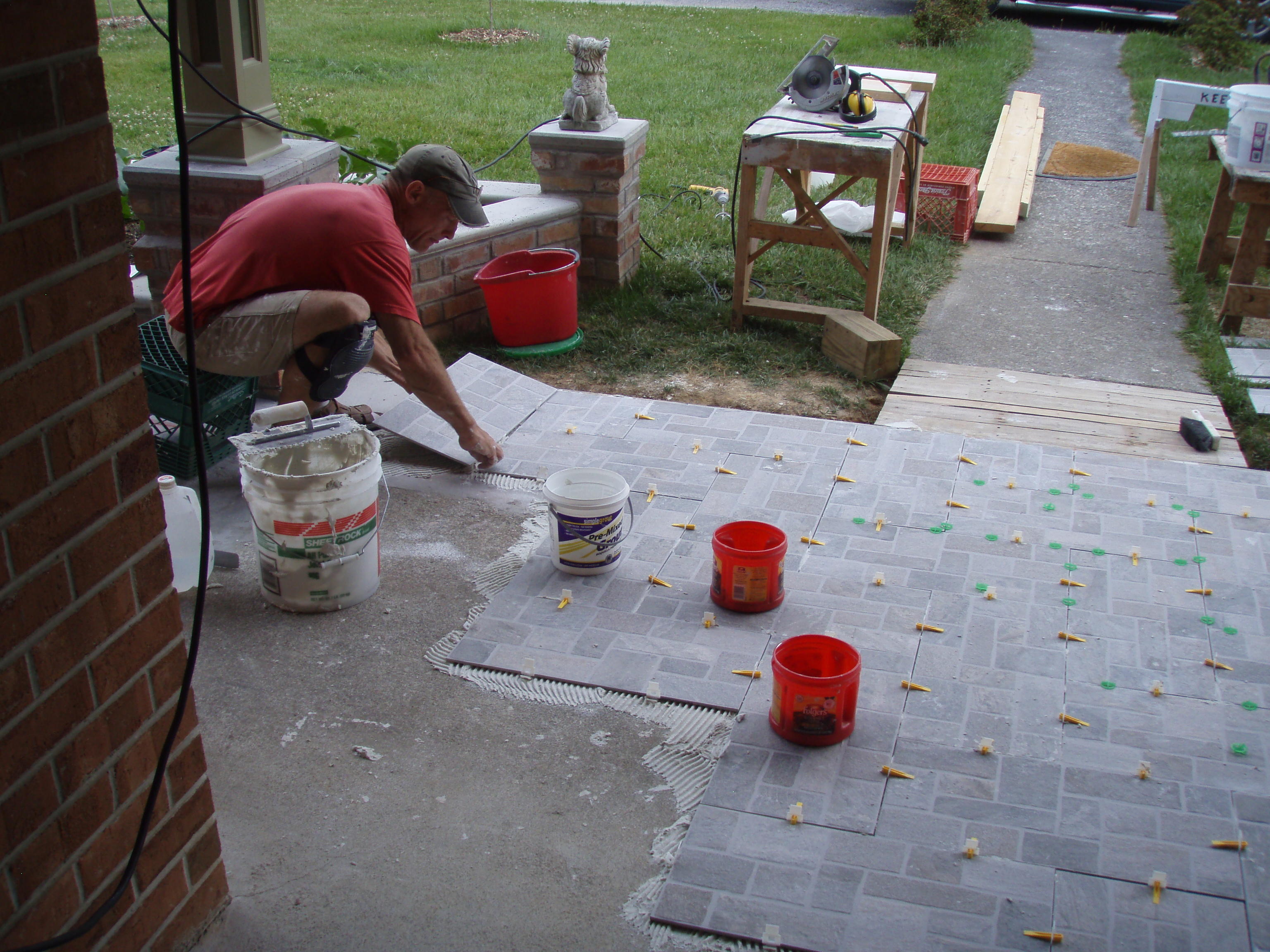 front gable porch with brick raised garden