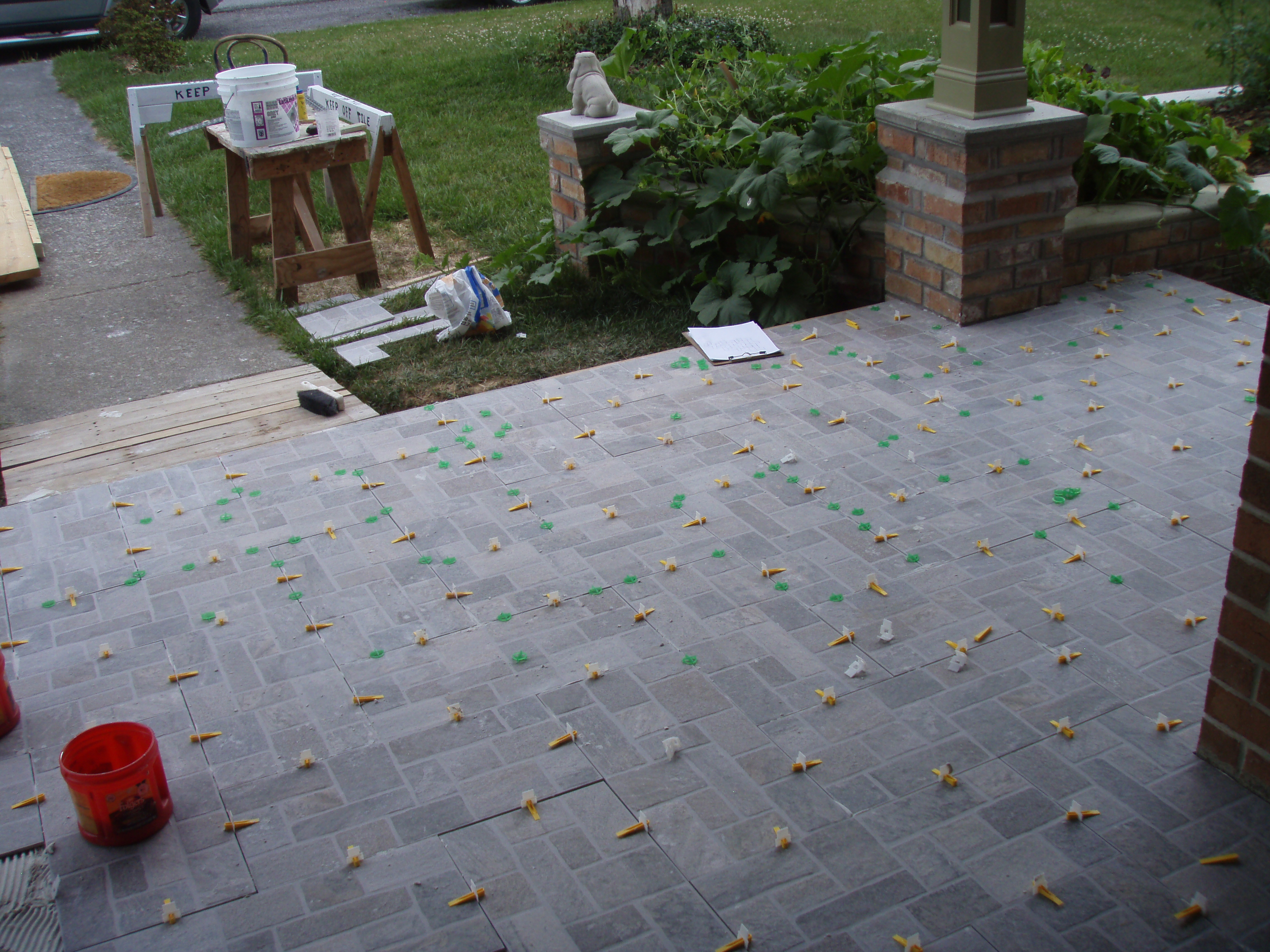 front gable porch with brick raised garden