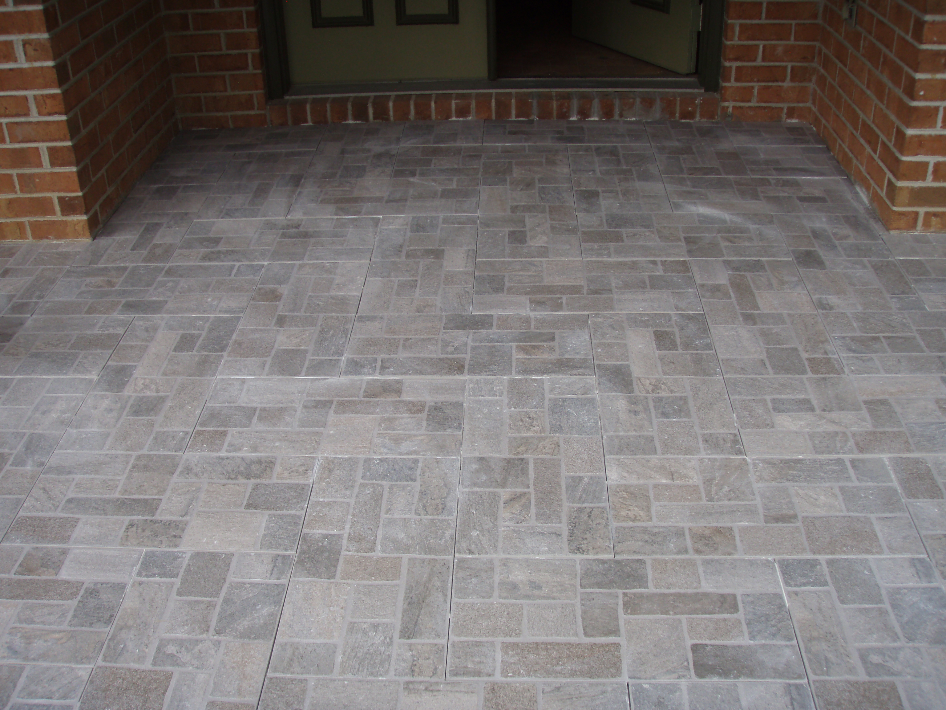 front gable porch with brick raised garden