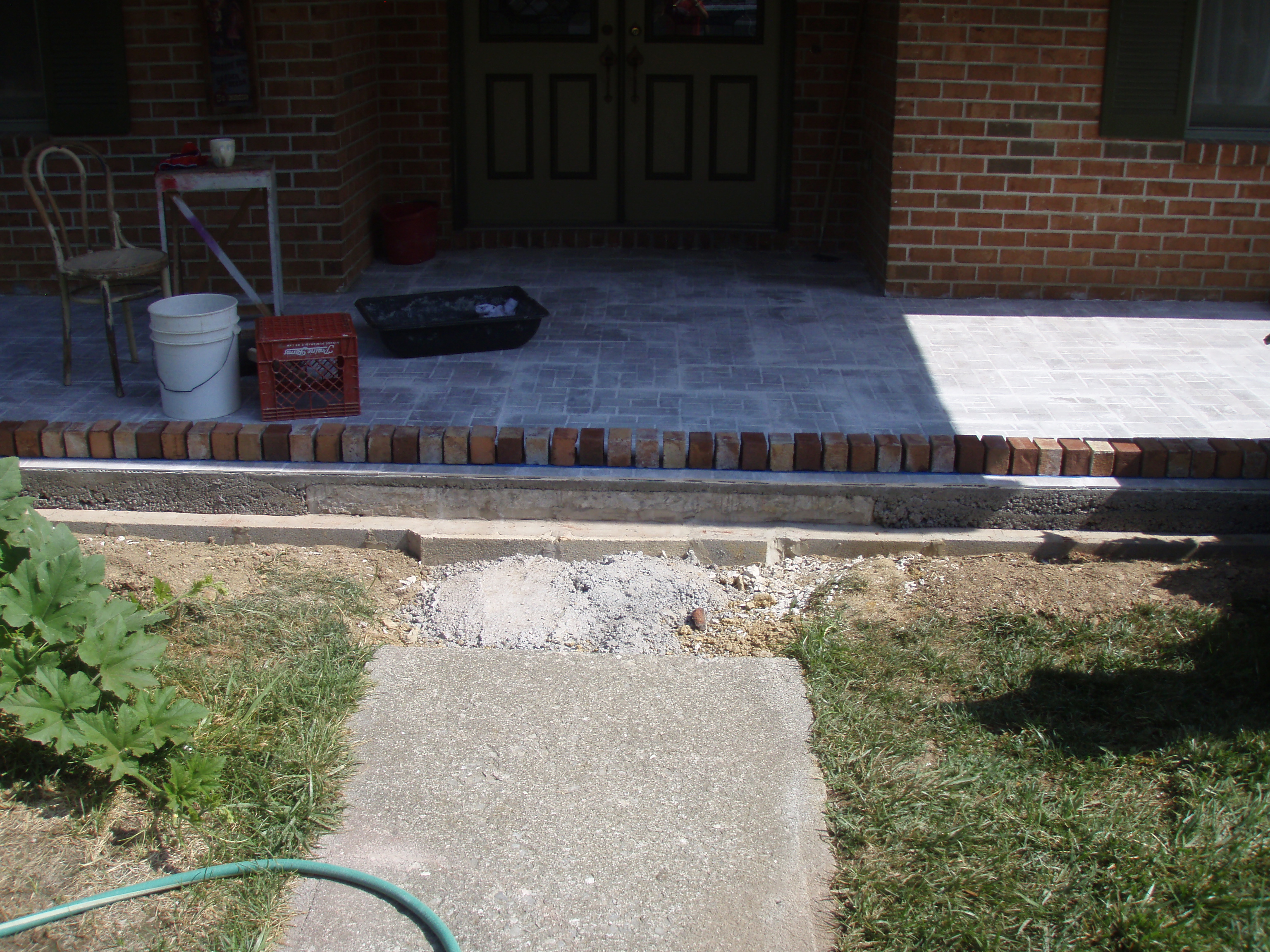 front gable porch with brick raised garden