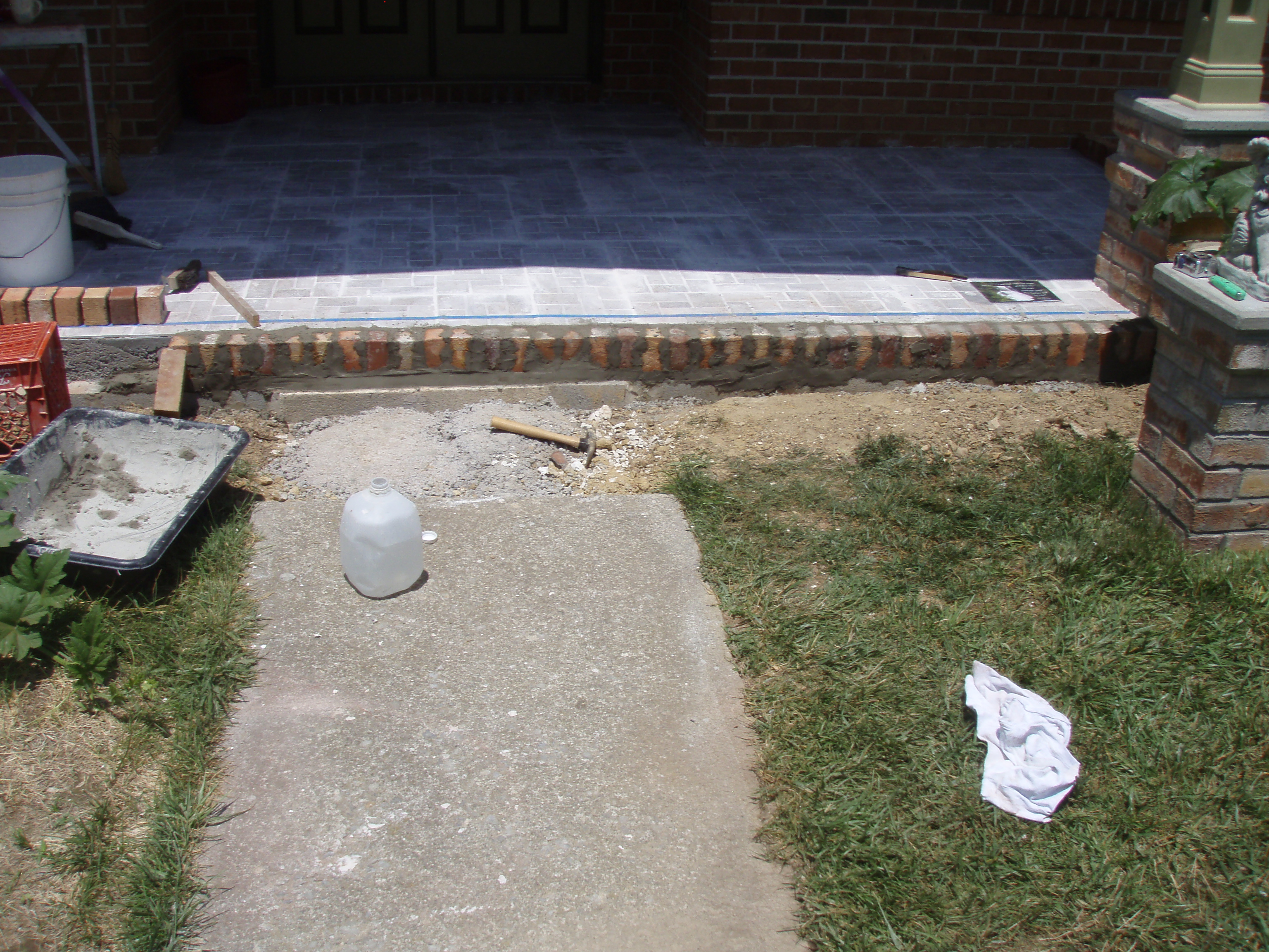 front gable porch with brick raised garden