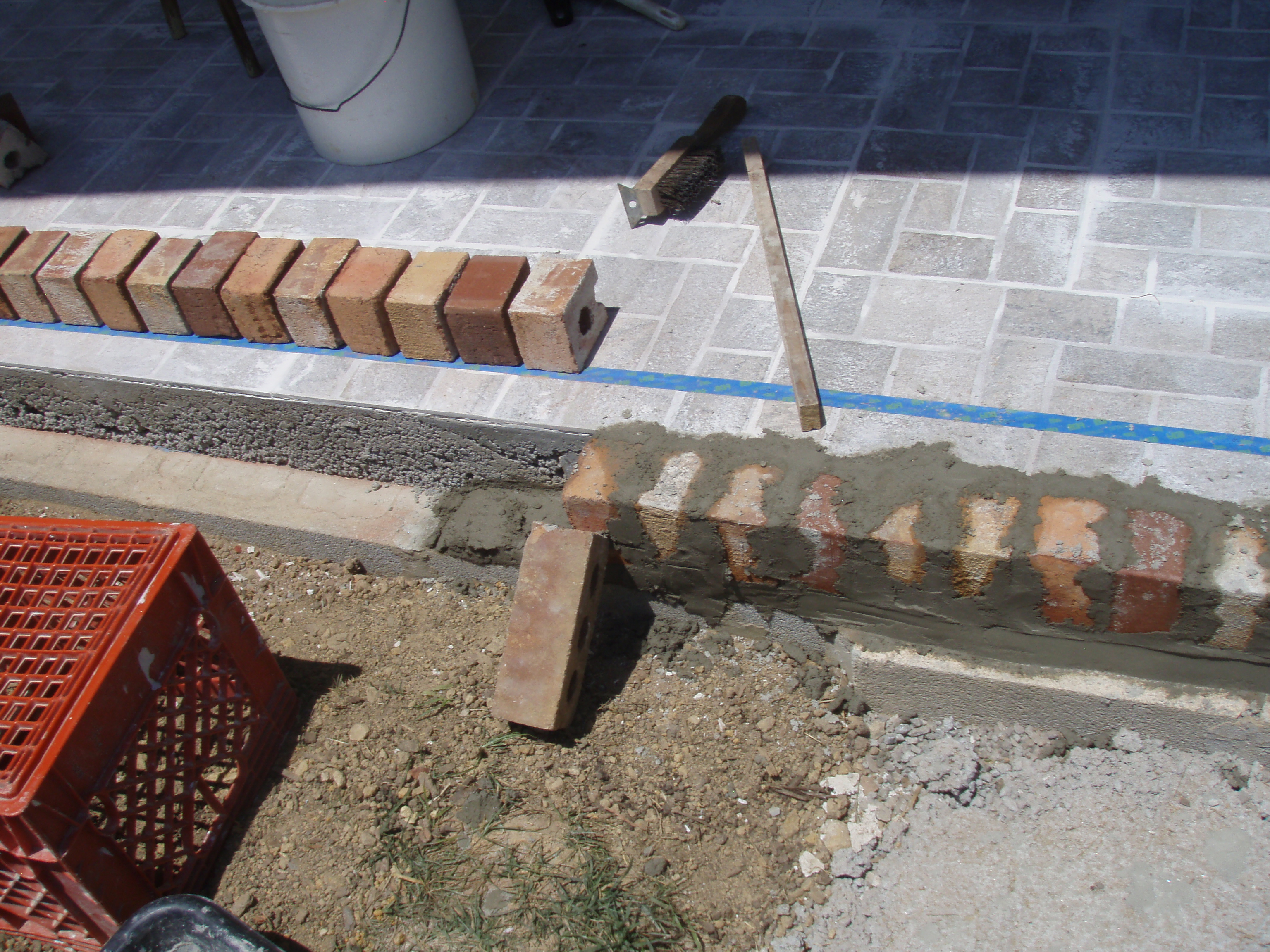 front gable porch with brick raised garden