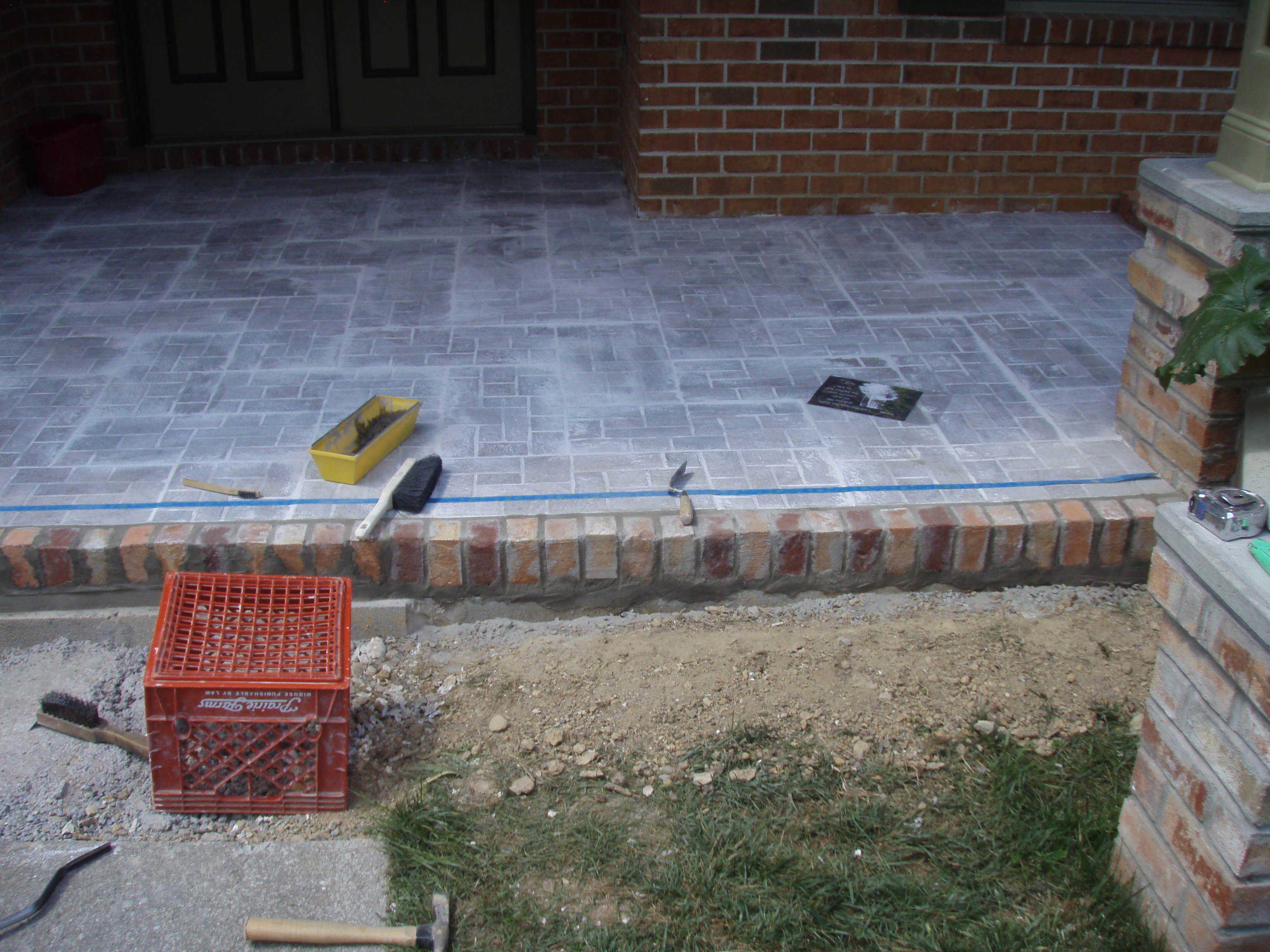 front gable porch with brick raised garden